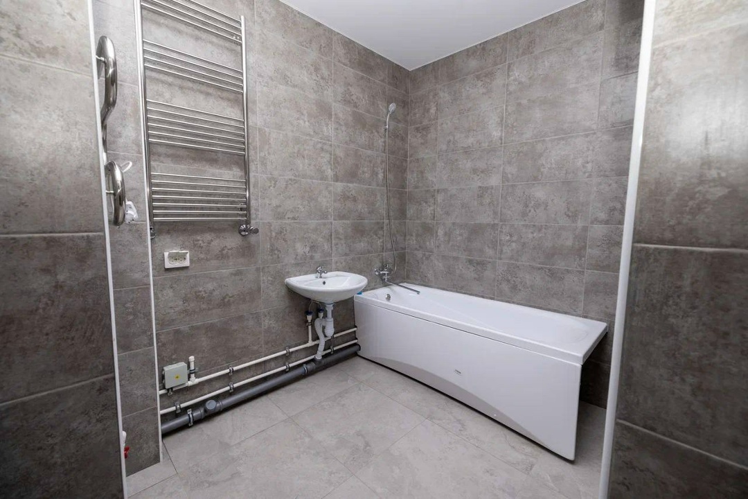 Алхимия новоселья В Когалыме завершается строительство самого высотного здания города — жилого комплекса «Философский камень»